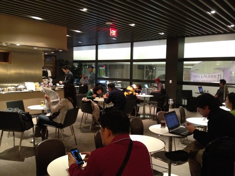 There was more seating, and more people, near the main food station towards the back of the room.