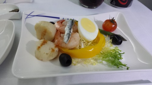 This was the salad I ordered. It had scallops, shrimp, half a boiled egg, and some other stuff plus an "anchovy-flavored, mayonnaise-based sauce". The scallops and shrimp were great, but the rest was average.