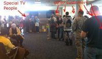a group of people waiting in line