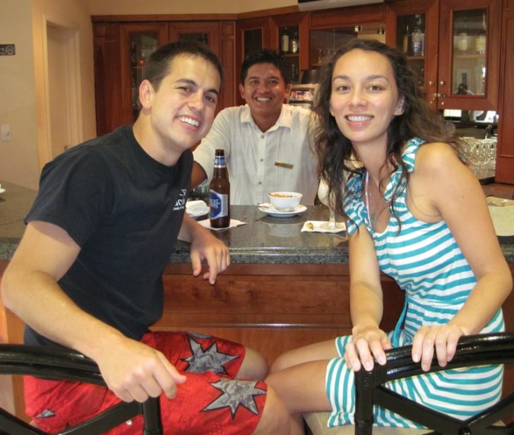 a group of people sitting at a table