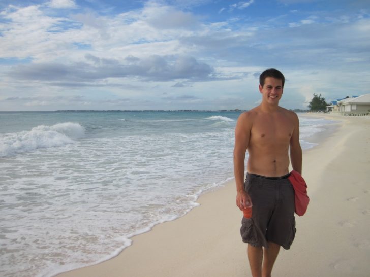 a man walking on a beach