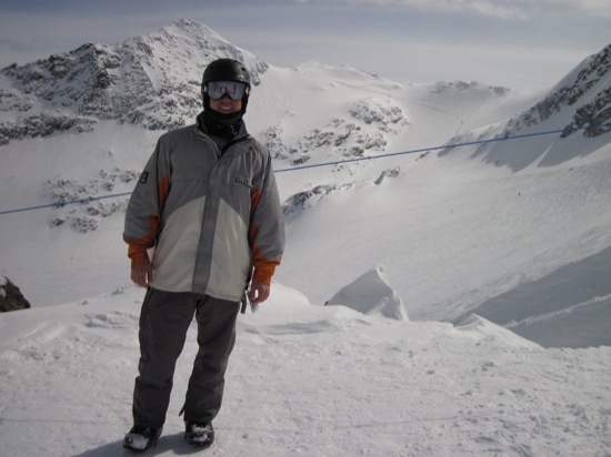 a man standing on a snowy mountain