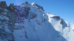 a mountain with snow on it