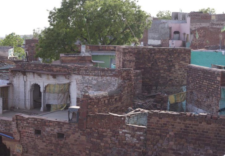 a brick building with a few bricks