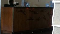 a reception desk with a person's face on it
