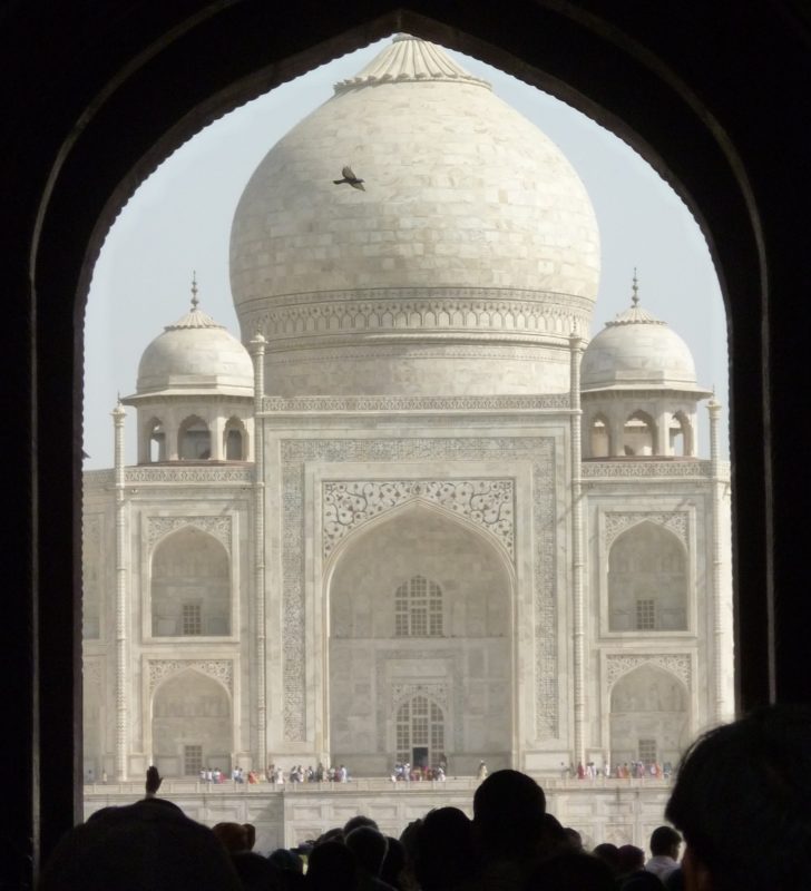 a large white building with a dome