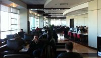 people sitting in a room with people