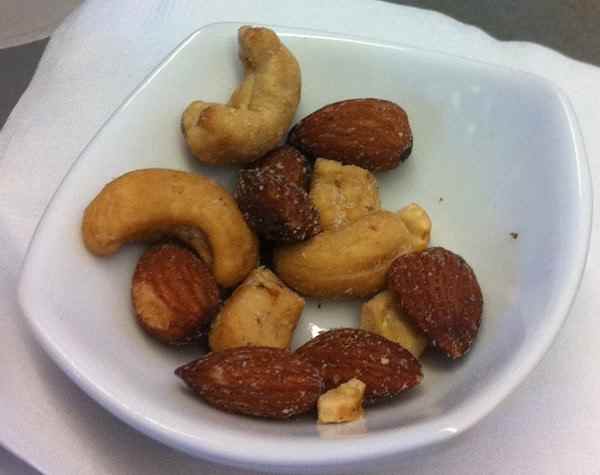 a bowl of nuts on a table