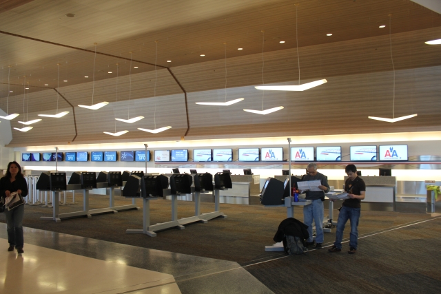 people standing in a terminal
