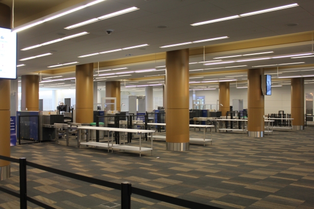 a large hall with tables and benches