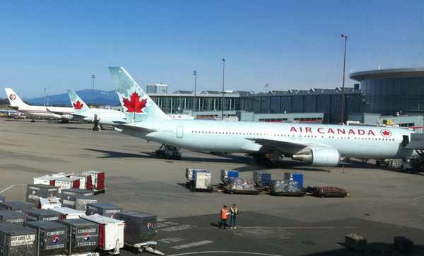 a large white airplane on the tarmac