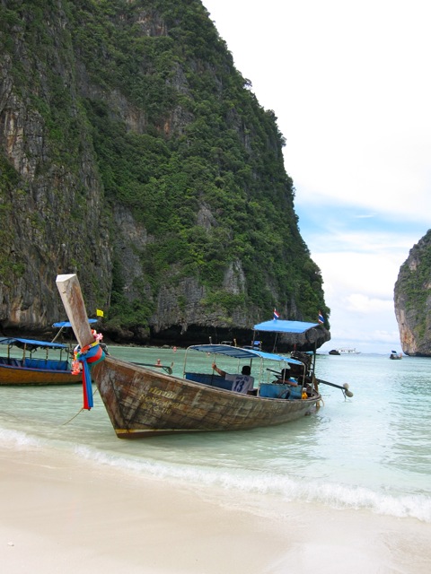 long shot of boats on a beach