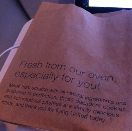 a brown paper bag with black text