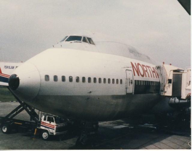 a large airplane parked at an airport