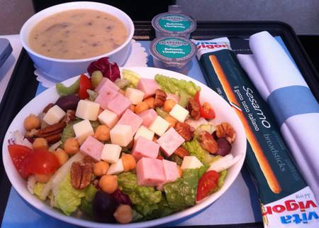 a bowl of salad and a bowl of soup