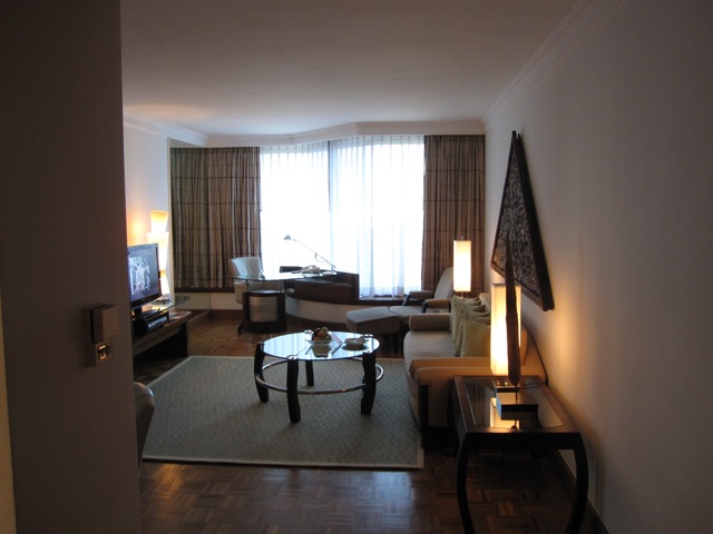 a living room with a couch and a tv