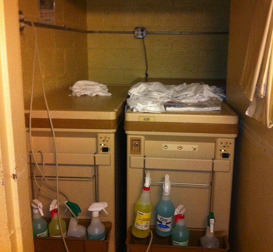 a room with a few machines and cleaning supplies
