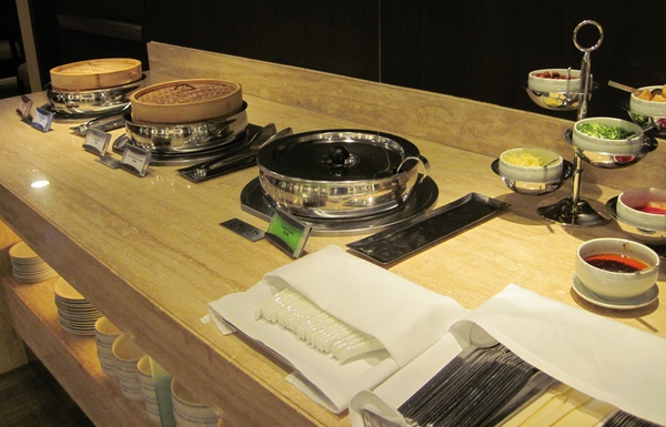 a buffet table with food items
