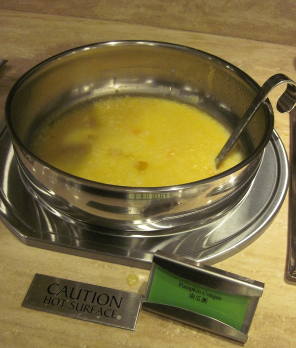 a bowl of soup with a spoon