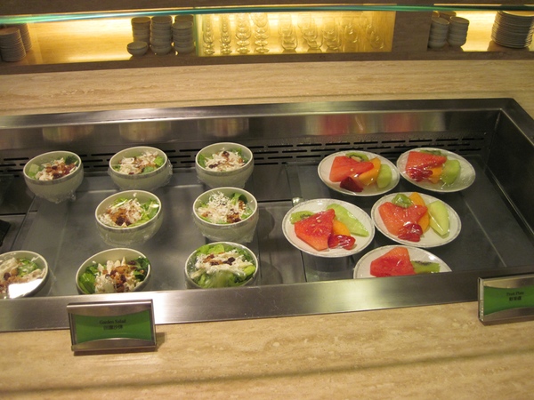 a variety of fruit salads in bowls
