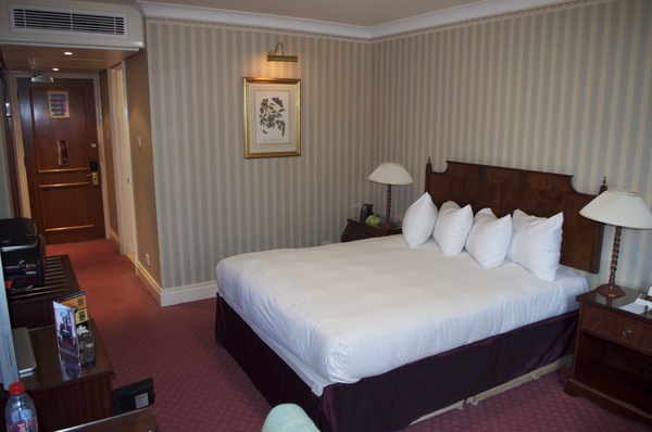 a hotel room with a bed