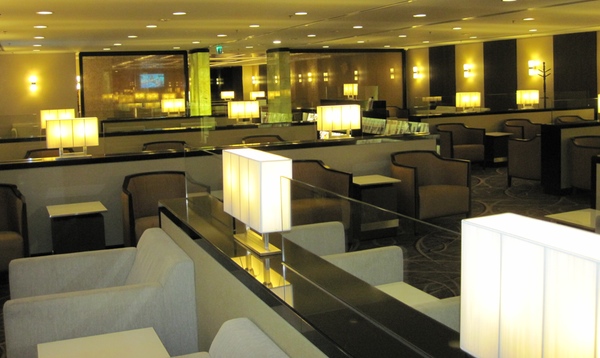 a room with a few chairs and a table