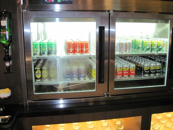 a beverage cooler with cans and cans