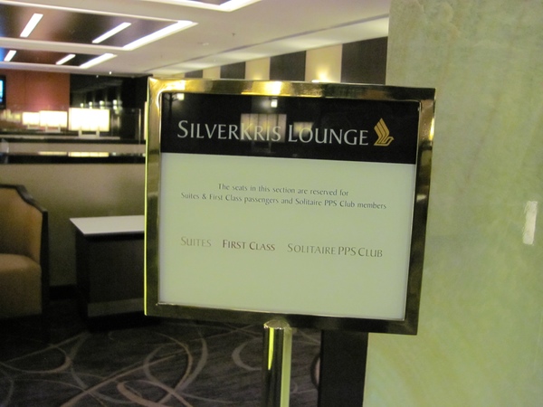 a sign in a hotel lobby