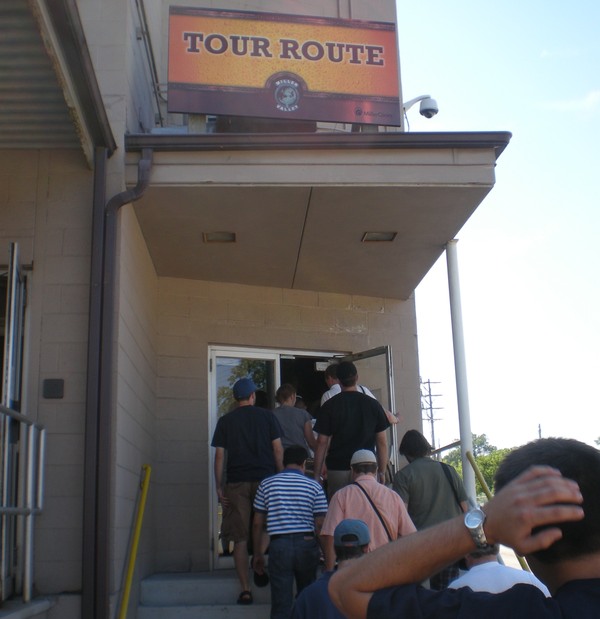 a group of people walking into a building
