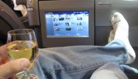 a person holding a glass of wine