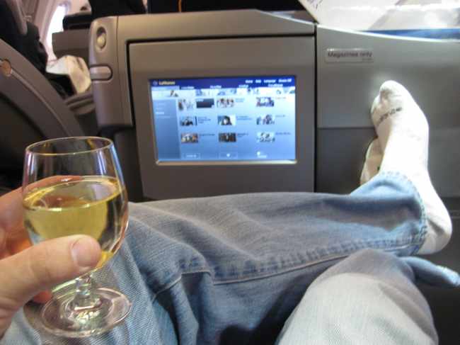 a person holding a glass of wine