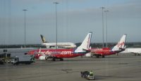 a group of airplanes on a runway