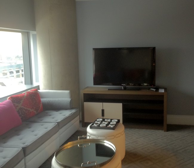 a living room with a couch and a television