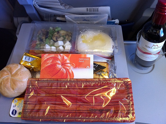 food in a tray on a plane