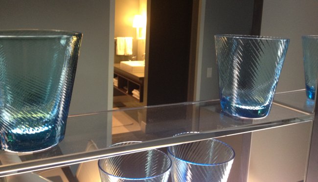 a glass vases on a shelf