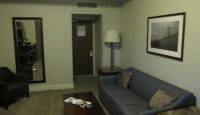 a room with a couch and a coffee table