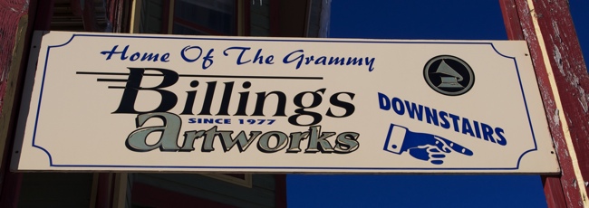 a sign with black text