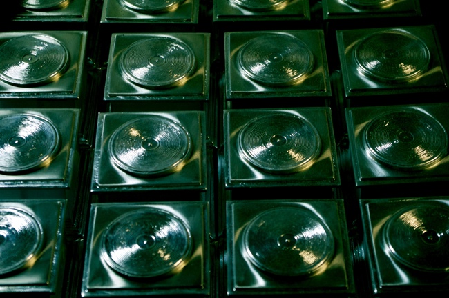 a group of shiny metal squares