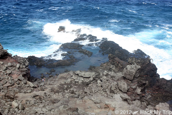 a rocky shore with waves crashing