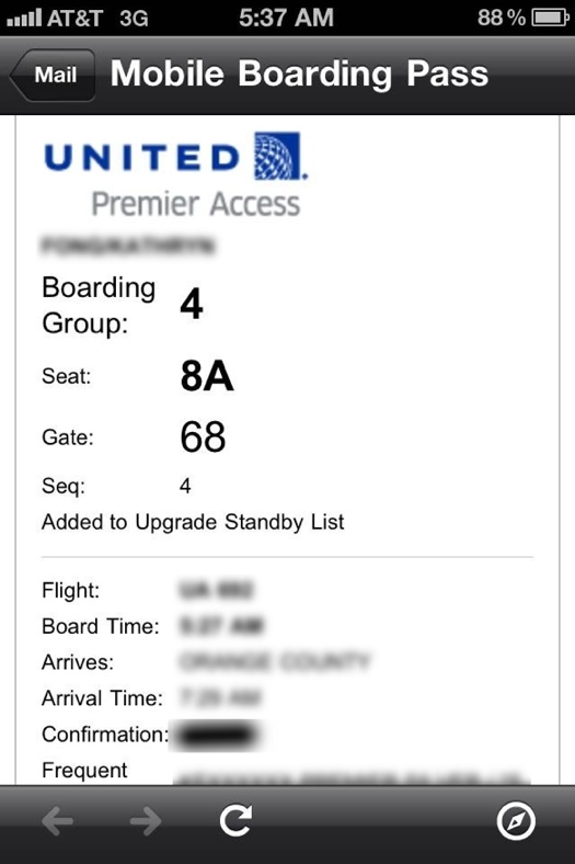 a close-up of a boarding pass