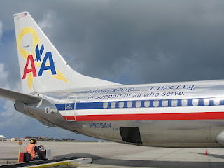 a plane being loaded onto a runway