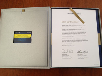 picture of opened MileagePlus Club Card book