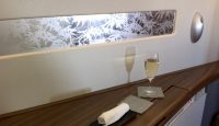 a glass of wine on a table