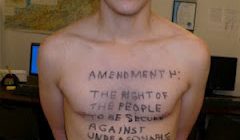 a man with writing on his shirt