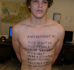 a man with writing on his shirt
