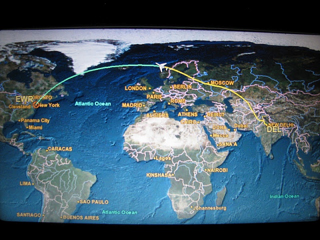 a map of the world with a plane flying