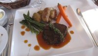 a plate of food with a fork and knife