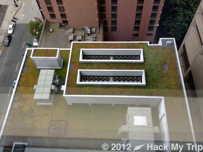 view of building below taken from hotel window
