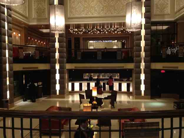 a room with a large staircase and a large bar