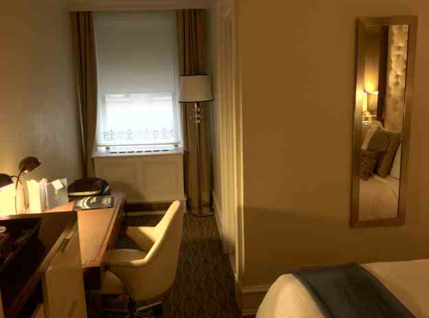 a room with a desk and chair